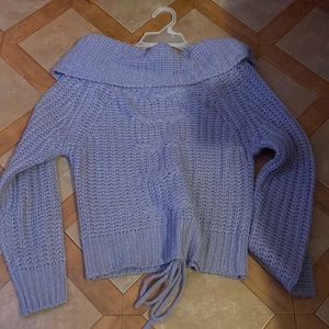 Never worn purple sweater, size small.